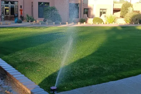 New sprinkler system installation on a lawn